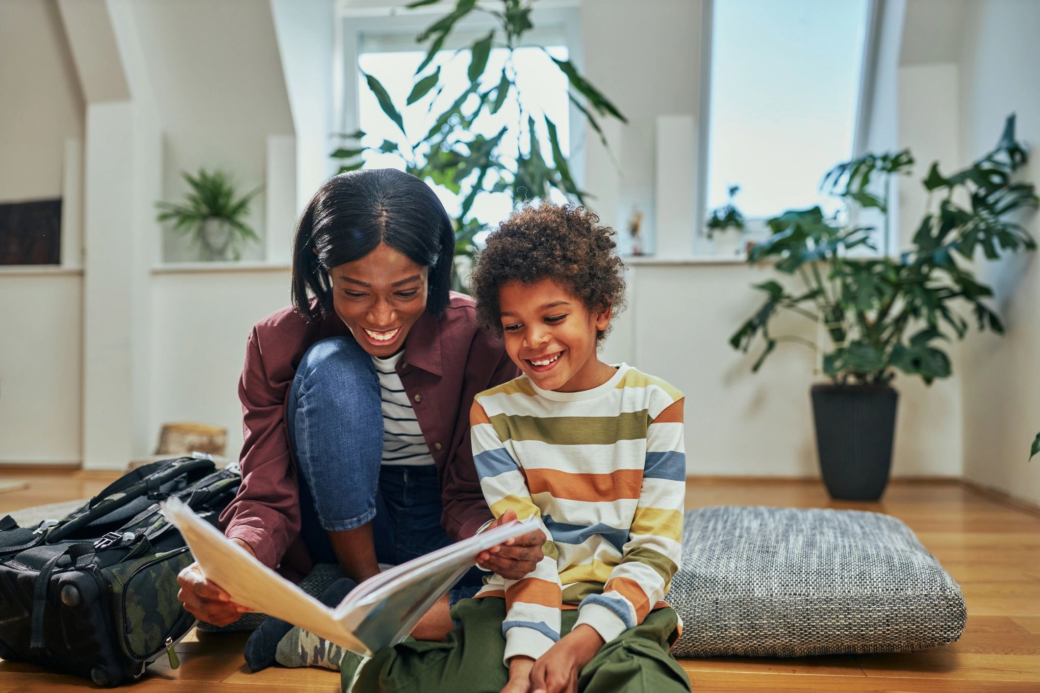 parent and child reading together modern home lavender colors