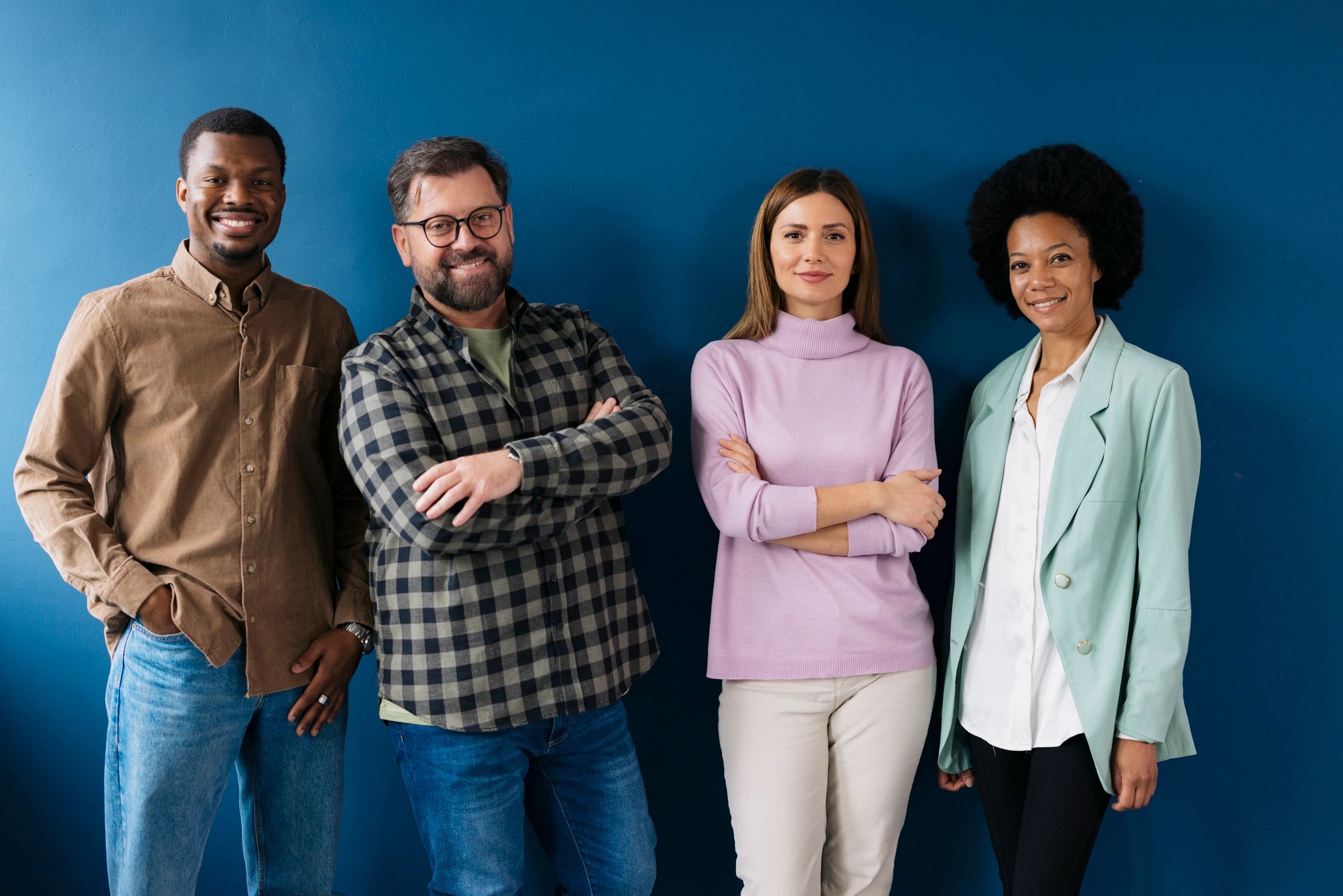 diverse educator team, modern, friendly, light blue background